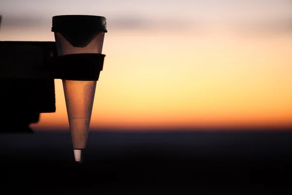 Rain gauge at sunrise — Stock Photo, Image