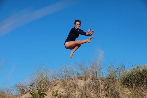 Gymnast jumping — Stock Photo, Image