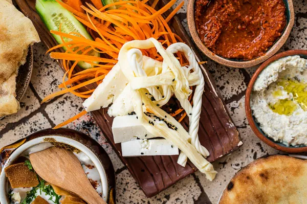 Cheese with herbs and vegetables served in Turkish Village Breakfast. Top view — Stock Photo, Image