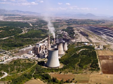 Power plant and surface mine aerial view clipart