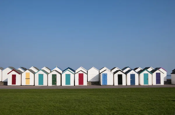 Stranden hyddor på paignton. — Stockfoto