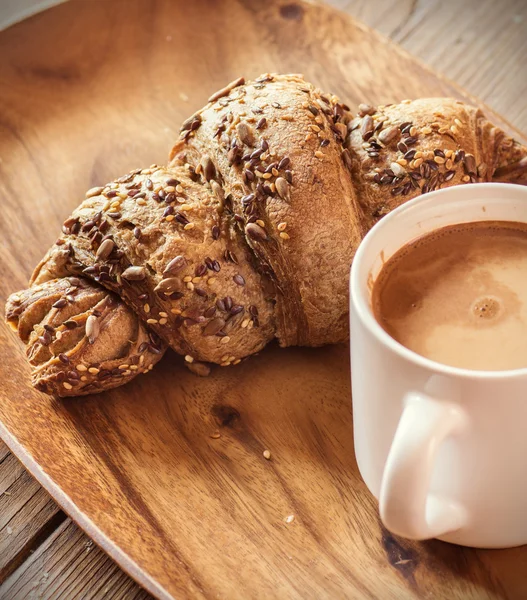 Coffee and whole wheat croissant — Stock Photo, Image