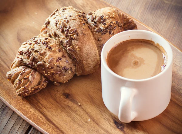 Coffee and whole wheat croissant — Stock Photo, Image