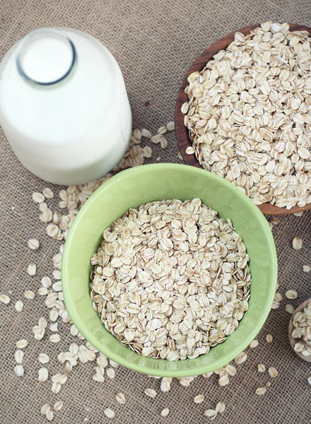 Bowl of oatmeal and milk — Stock Photo, Image