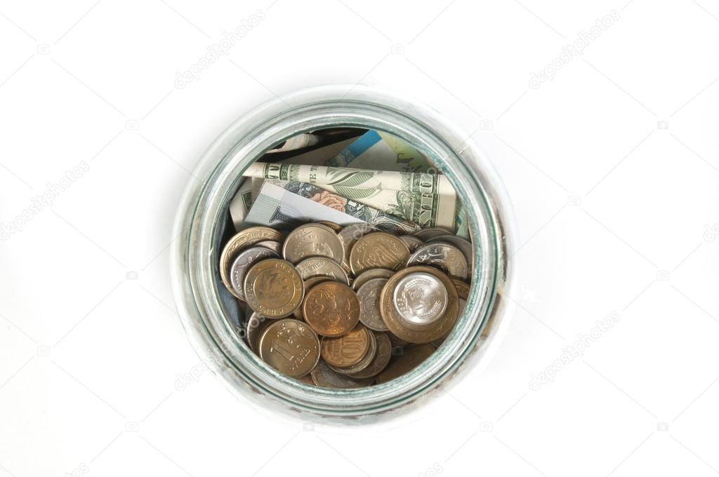 Glass jar with money top view