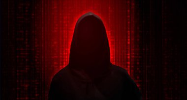 Casus ajan, hacker. Esrarengiz adam koyu kırmızı arka planda