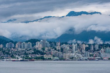 Low cloud over the mountains and the North Vancouver skyline