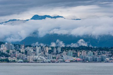 Low cloud over the mountains and the North Vancouver skyline