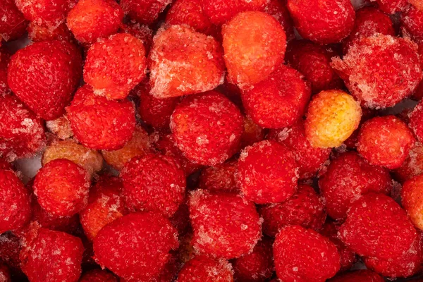 Fondo de fresas congeladas, baya roja helada Imágenes De Stock Sin Royalties Gratis