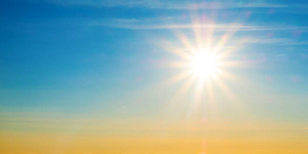 beautiful setting sun and blue sky with copy space.