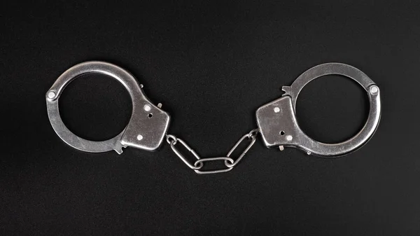 Handcuffs Black Background Concept Arrest — Fotografia de Stock