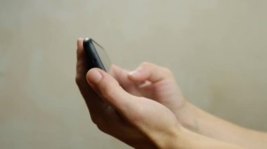 scrolling view photos on the mobile phone close-up. High quality FullHD footage