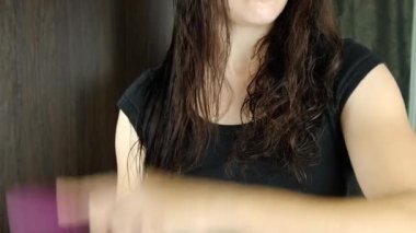 woman brushing her hair after shower. High quality FullHD footage