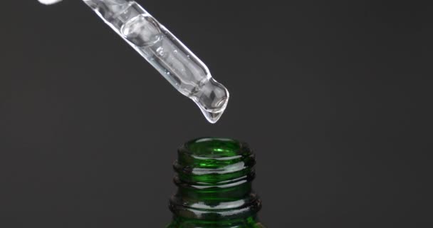 Pipette Cannabis Oil Extract Drop Dripping Bottle Dark Background High — Vídeos de Stock