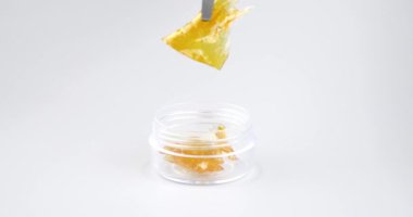 medicinal golden extract cannabis wax . High quality 4k footage