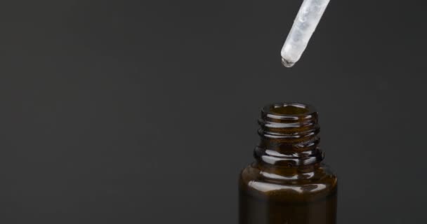 Pipette Cannabis Oil Extract Drop Dripping Bottle Copy Space Dark — Vídeo de Stock