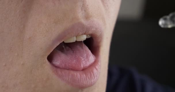 Woman Taking Medicine Cannabis Oil Drip Drops Pipette Mouth High — Αρχείο Βίντεο