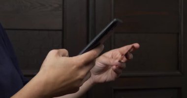 transfers electronic money from the card using the phone, buying goods online. High quality 4k footage