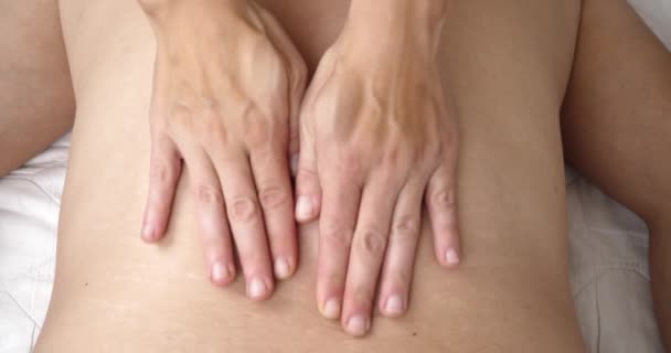Female Hands Doing Back Massage Top View High Quality Footage — Stock Video
