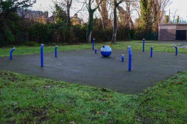 Prestatyn, UK:Dec 14, 2021: Coronation Gardens is a public park in Prestatyn. It includes a SportACTIV gaming area which was installed by Wicksteed Playscapes.