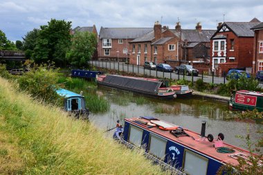 Chester, UK: Jul 3, 2022: A general scene of the Shropshire Union Canal in Chester, with narrow boats moored in the Williams Moorings
