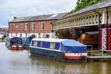 Chester, UK: Jul 3, 2022: A general scene of the Shropshire Union Canal adjacent to Taylor's Boatyard in Chester
