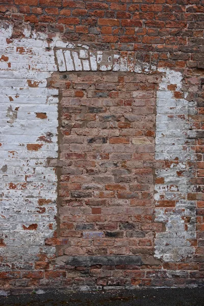 Red Brick Wall Blocked Doorway Decaying White Paint — 图库照片