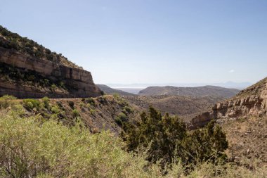View from Cloudcroft of a canyon and White Sands National Park i