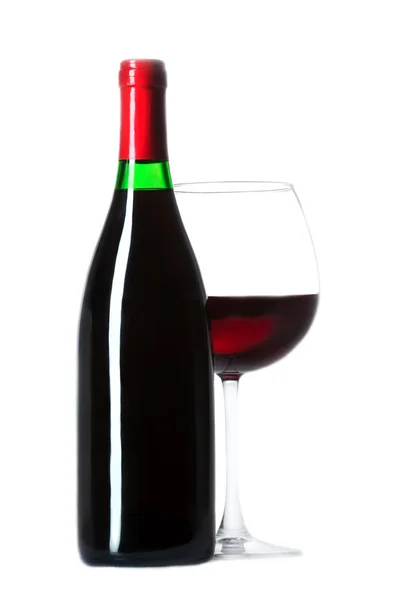 Garrafa e um copo cheio de vinho — Fotografia de Stock
