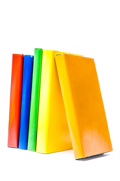 Livros reais coloridos sobre fundo branco — Fotografia de Stock