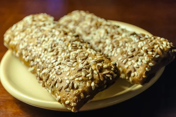 Two sereal bars on a plate — Stock Photo, Image