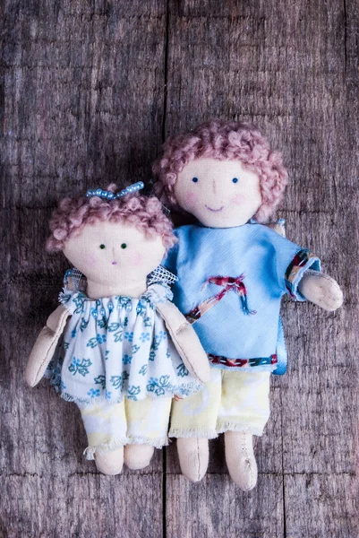 Couple of dolls on wood — Stock Photo, Image