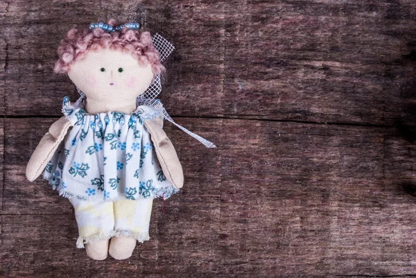 Doll on wood — Stock Photo, Image