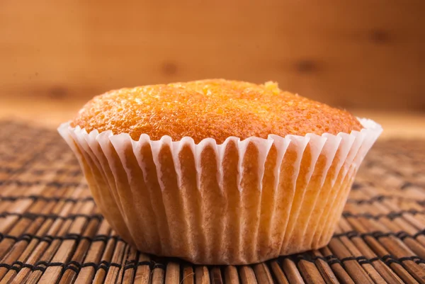 Close-up of cupcakes on wooden board. — Stock Photo, Image