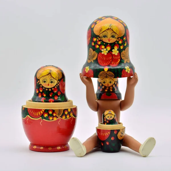 Russian dolls, matryoshkas, put in different ways, isolated over white