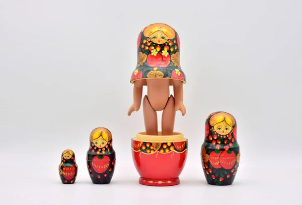 Russian dolls, matryoshkas, put in different ways, isolated over white