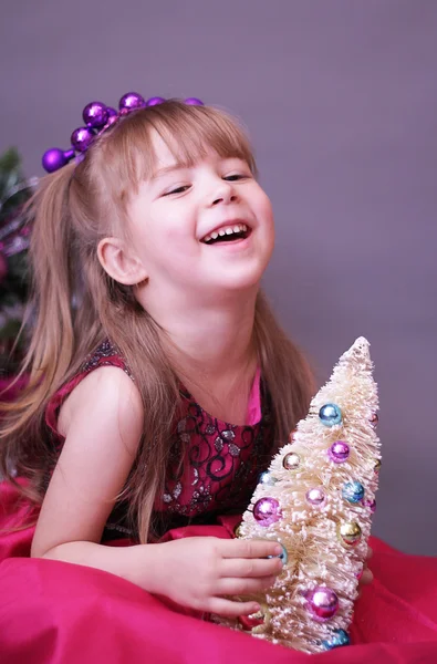 かわいいクリスマスの女の子 Stockbild