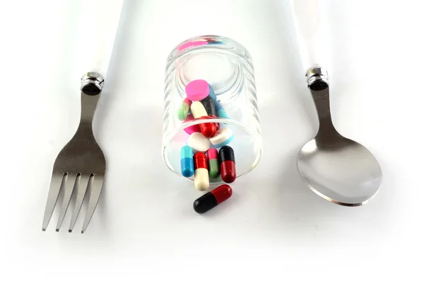 Spoon Fork with pills — Stock Photo, Image