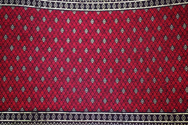 Kleurrijke batik doek stof achtergrond — Stockfoto