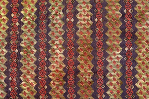 Kleurrijke batik doek stof achtergrond — Stockfoto