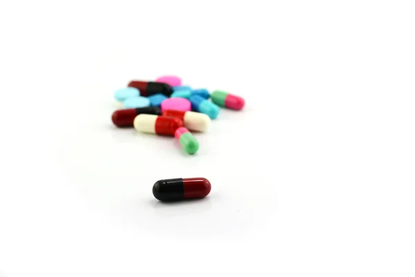 Colorful medical pills and capsules on white background. — Stock Photo, Image