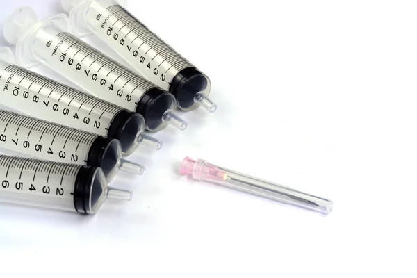 Medical syringes on a white — Stock Photo, Image