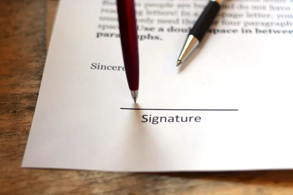 Signature with pen — Stock Photo, Image