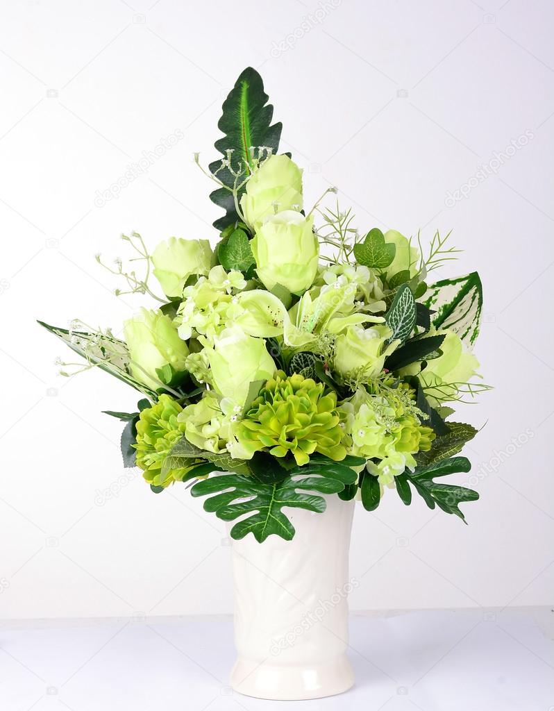 green flowers in vase isolated