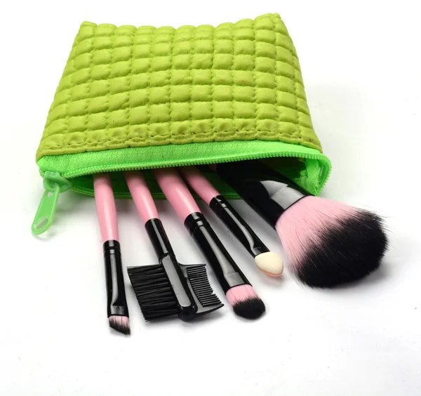 Kosmetika v zelený vak — Stock fotografie