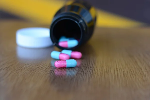 Pills and bottle — Stock Photo, Image