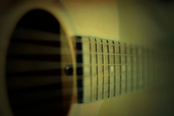 Detail of acoustic guitar with shallow depth of field — Stock Photo, Image