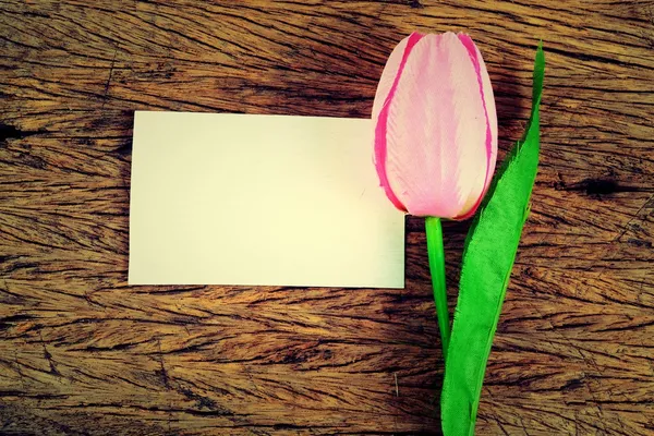 Purple tulips and blank card — Stock Photo, Image