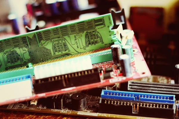 Putting RAM into the memory slot on motherboard — Stock Photo, Image