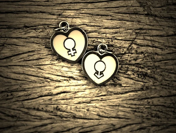 Male And Female Symbols on a heart — Stock Photo, Image